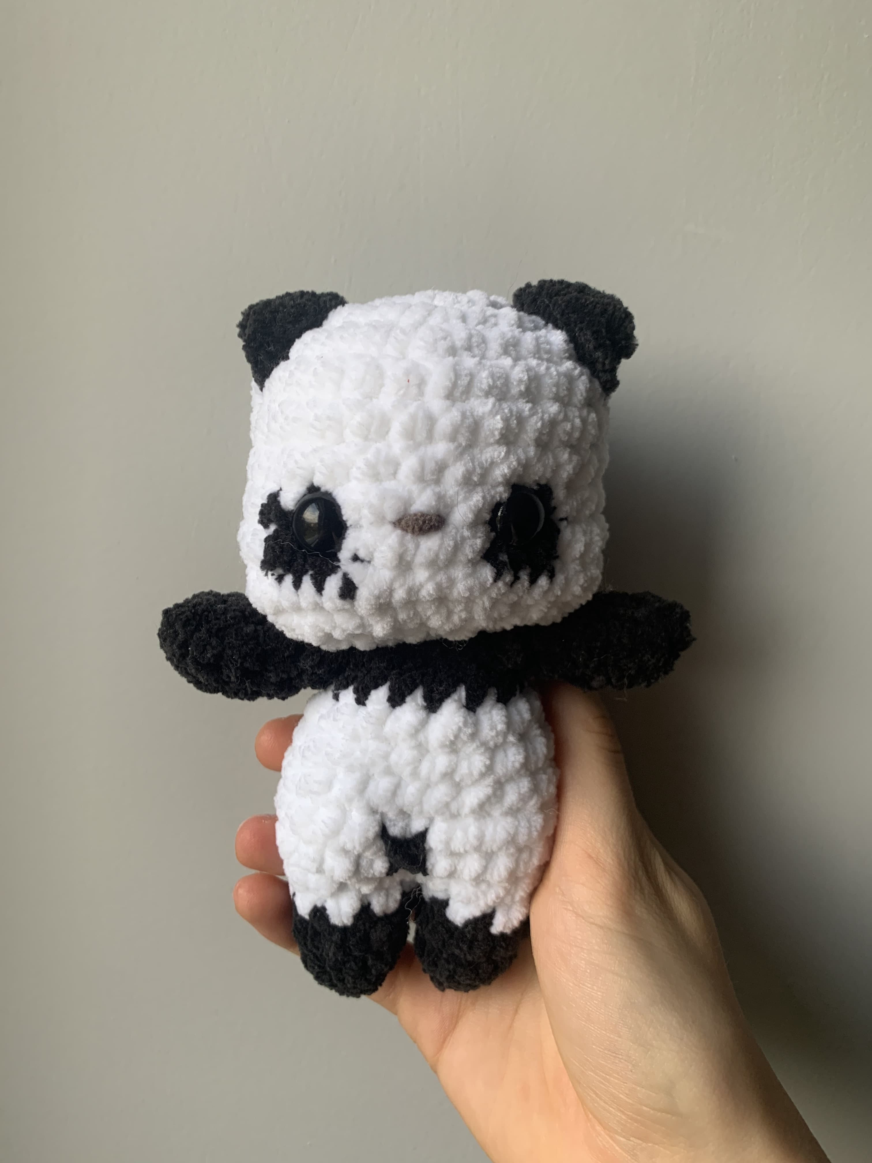 Panda blanc cassé et noir 